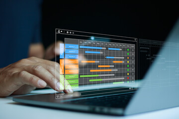 Project management and business planning concept. Planner working on laptop with Gantt chart dashboard, workflow timeline task, data analytics, productivity tracking, digital management software.