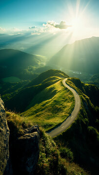 Winding Mountain Road Along Green Ridge At Golden Hour
