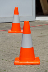 Orange Traffic Cones on City Sidewalk