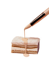 Cake slice being covered in dripping frosting by brush