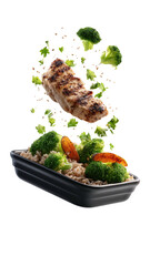 Grilled chicken, broccoli, carrots over grains, some falling into container