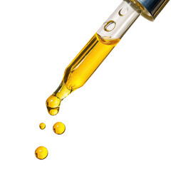 Golden liquid drips from glass dropper on black background, droplets suspended