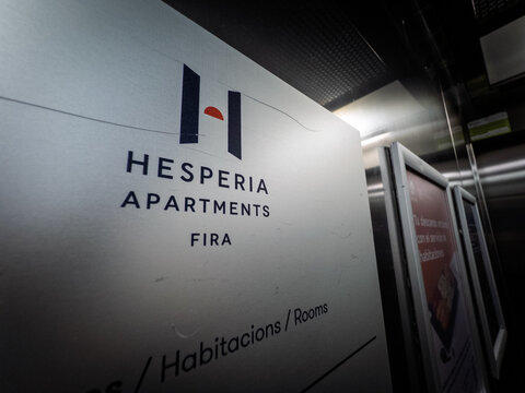 BARCELONA, SPAIN - APRIL 5, 2025: Close-up of Hesperia Apartments Fira logo on a wall in Barcelona, Spain. Hesperia Hoteles is a Spanish chain of hotels.