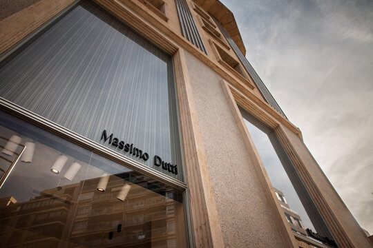 VALENCIA, SPAIN - APRIL 6, 2025: Massimo Dutti logo on the facade of a retail clothing store in Valencia. Massimo Dutti is a fashion designer, manufacturer and retailer from Spain owned by Inditex.