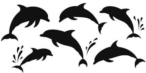 Obraz premium Dolphins jumping in ocean with playful silhouettes
