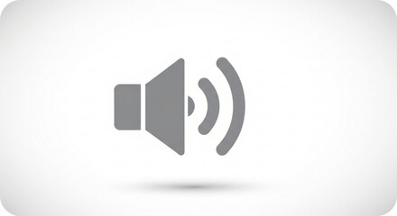 Gray speaker icon with sound waves on white background symbolizing audio