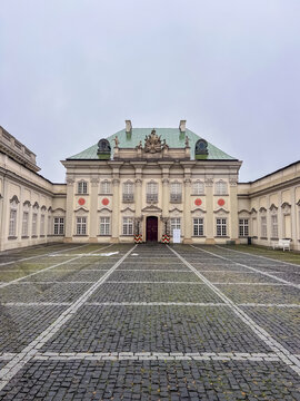 Copper-Roof Palace (Pod Blacha Palace) - State Museum and Exhibition Hall in Old Town in Warsaw, Poland. Exploring a historic building in a quiet courtyard during cloudy weather