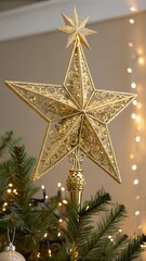 Golden star tree topper. Classic festive tradition.