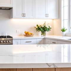 Bright kitchen with white shaker cabinets, marble countertops, stainless sink, and soft natural light illuminating a clean, modern cooking space