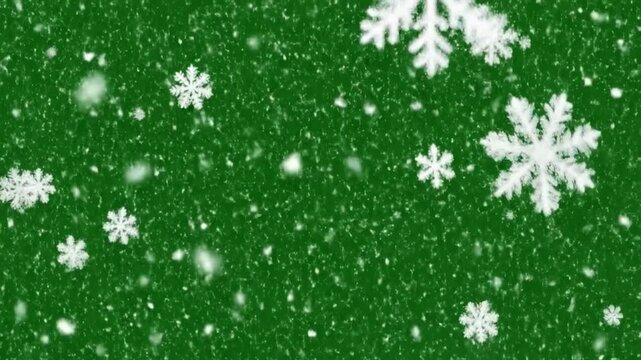 Snowflakes falling on a dark green background