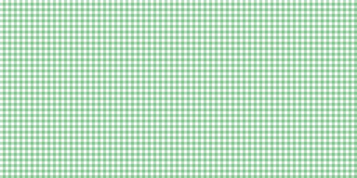 Green gingham checkerboard pattern background. Classic checkered plaid texture for picnic blankets, tablecloths, fabric prints, and spring-themed graphic design backdrops.