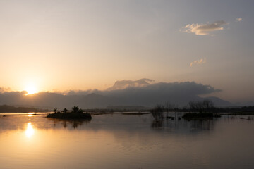 A nature view of sunset or sunrise over lake at Phang Nga Thailand