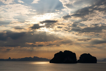 Landscape view of majestic clouds in the sky sunset or sunrise over sea