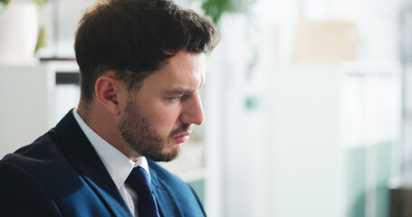 Fototapeta premium Thinking, man and lawyer worry in office for case loss, legal error and compliance failure. Disappointed, male attorney and reflection with damaged reputation, contract breach and negligence lawsuit