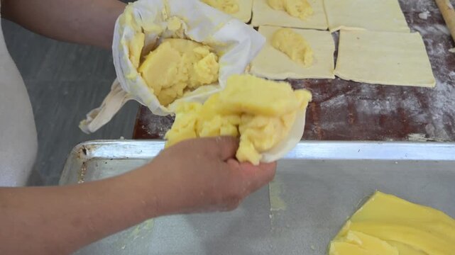 PREPARING THE CREAM TO FILL THE EMPANADAS