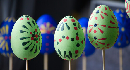 Beautifully decorated Easter eggs on display, showcasing vibrant colors and artistic designs.