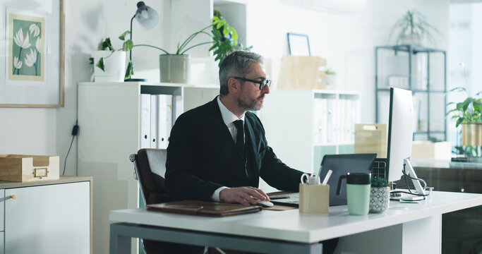 Research, planning and computer with business man in office for stock market broker, reading and account report. Risk assessment, online and investor trading with mature person for virtual advisor