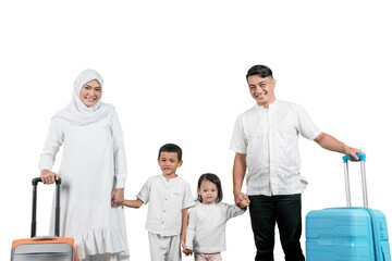Fototapeta premium Smiling Muslim Family with Two Children Ready for Travel with Suitcases (Mudik)