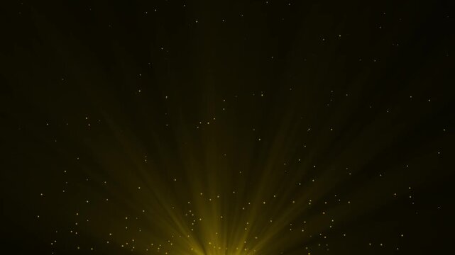 Abstract golden light rays bursting upwards from the bottom center, illuminating dark space filled with small glowing particles and dust, creating a dramatic and magical atmosphere