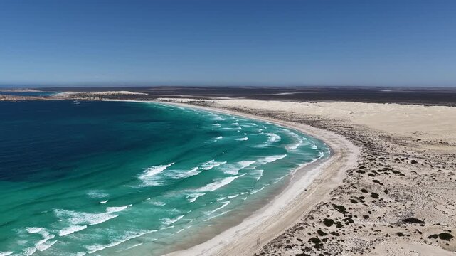 Scott Bay, Fowlers Bay, South Australia &ndash; 4K aerial drone view of Great Australian Bight coastline, turquoise ocean, sand dunes, white sand beach and limestone cliffs