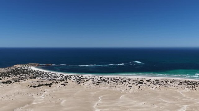 Scott Bay, Fowlers Bay, South Australia &ndash; 4K aerial drone view of Great Australian Bight coastline, turquoise ocean, sand dunes, white sand beach and limestone cliffs