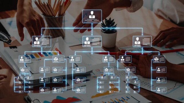 A collaborative business environment featuring a digital organizational chart, highlighting teamwork, strategy, and effective communication in a modern office setup. Raster