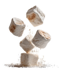 Fluffy, cubed marshmallows in mid-air,  with a powdered dusting