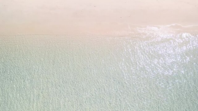Aerial Shoreline Waves On White Sand Beach Crystal Clear Water Texture