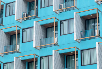Blue building hotel with pattern window block design
