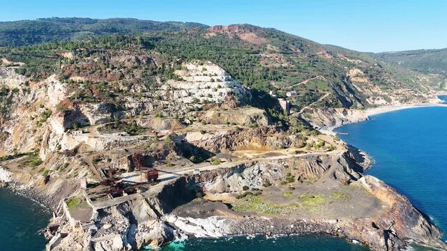 Drone flight over an abandoned iron mine on the island of Elba in Tuscany, Italy.