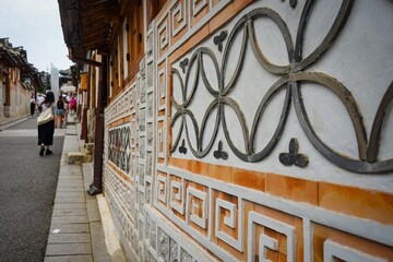 Close-up view of artistic design elements at the historic Bukchon Hanok Village with hanok style homes