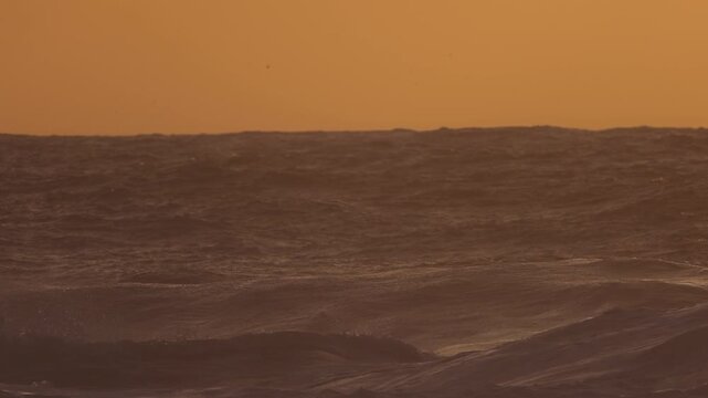 Waves crashing on storm day in slow motion