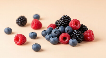Fresh mixed berries on pastel background, minimal look