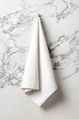 White Kitchen Towel Hanging On Marble Wall