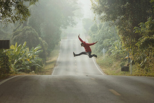 man on the empty road - direction and freedom concept