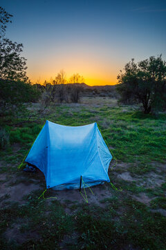 Ultralight tent pitched on the Pacific Crest Trail at sunset