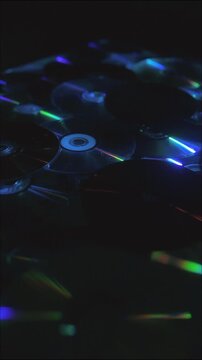 Colorful reflections: vibrant light patterns on spinning cds in motion