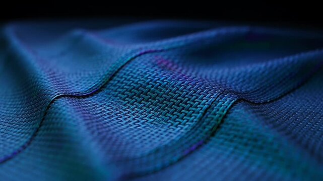 Blue textured fabric macro creating abstract wavy patterns