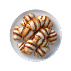 Pastries filled with a dark filling arranged atop white circular plate from above