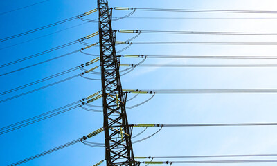 High voltage electric pole power line electric transmission tower background, technology energy...