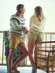 Naklejka premium Back, couple and thinking on patio outdoor with love, calm morning and reflection on holiday. Thoughts, people and terrace for fresh air, daydreaming and bonding together in nature at vacation house