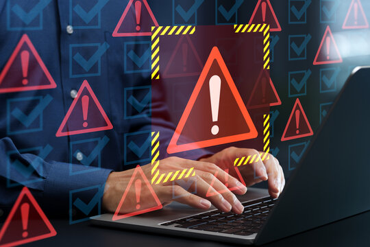Insecure configuration and security misconfiguration. Outdated risky software and unencrypted data transmission. Businessman using laptop computer in violation of security compliance.