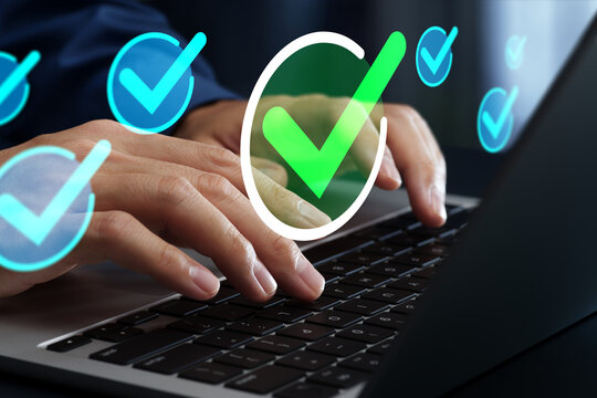 Task completion and approval process. Automated request submission workflow. Checkmark icons. Businessman using laptop computer to manage tasks.