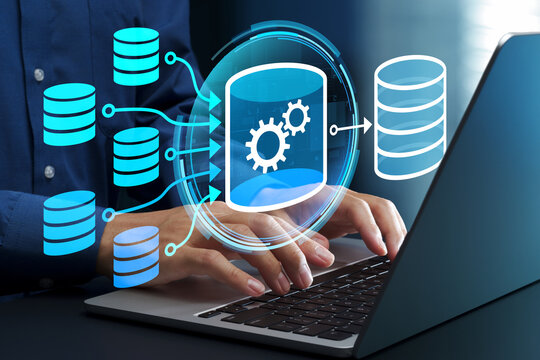 Data integration and ETL processes for building data warehouses. Automating ETL workflows for extracting, transforming,and loading data. Businessman using laptop computer for data management.