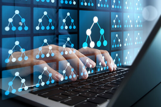 Random forest model in machine learning. Data analysis with regression and classification models. Data scientist using laptop computer for ensemble learning.