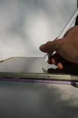 Laptop and computer mouse on a clean desk, home office or remote work concept.
