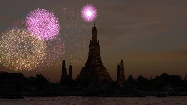 Colorful Fireworks Display Over Wat Arun Temple in Bangkok at Dusk