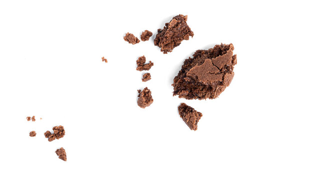 Chocolate brownie cookie crumbs on a white background. High quality photo
