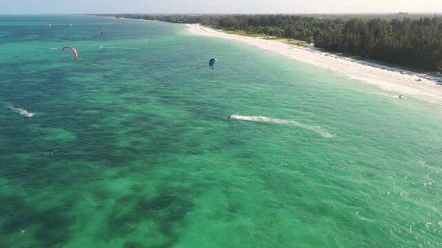 Aerial view of kitesurfers at paje beach, zanzibar