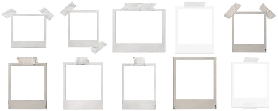 collection of blank polaroid-style photo frames with masking tape, set against a dark background, ready for images.